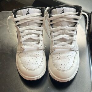 White and black Jordan’s 1 size 5.5Y high top